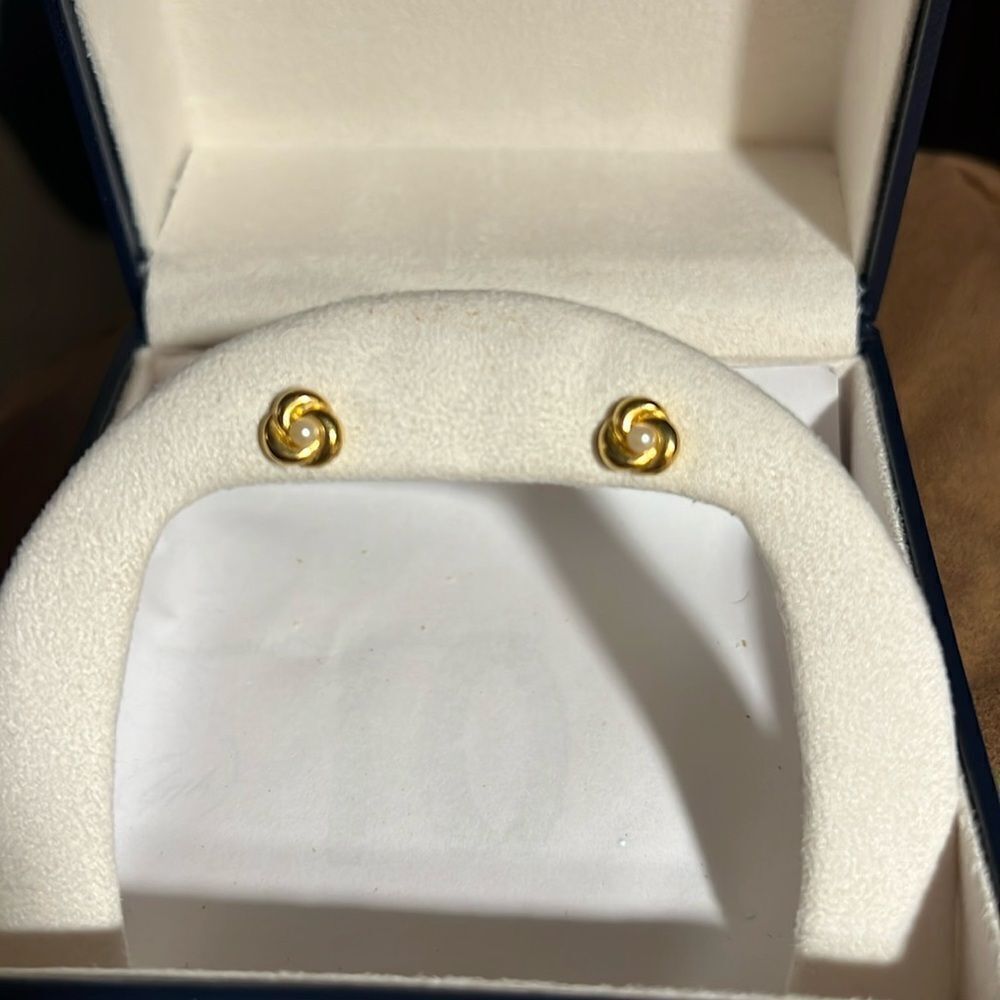 Faux gold with pearl pierced earrings.